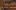 Sam Wanamaker Playhouse Pete Le May An indoor wooden playhouse lit by candles