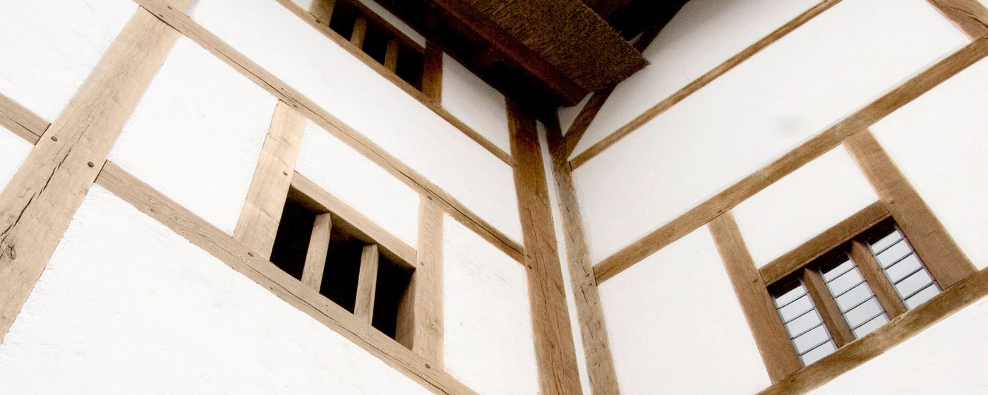 Shakespeare's Globe Theatre Close up details of a white walled theatre